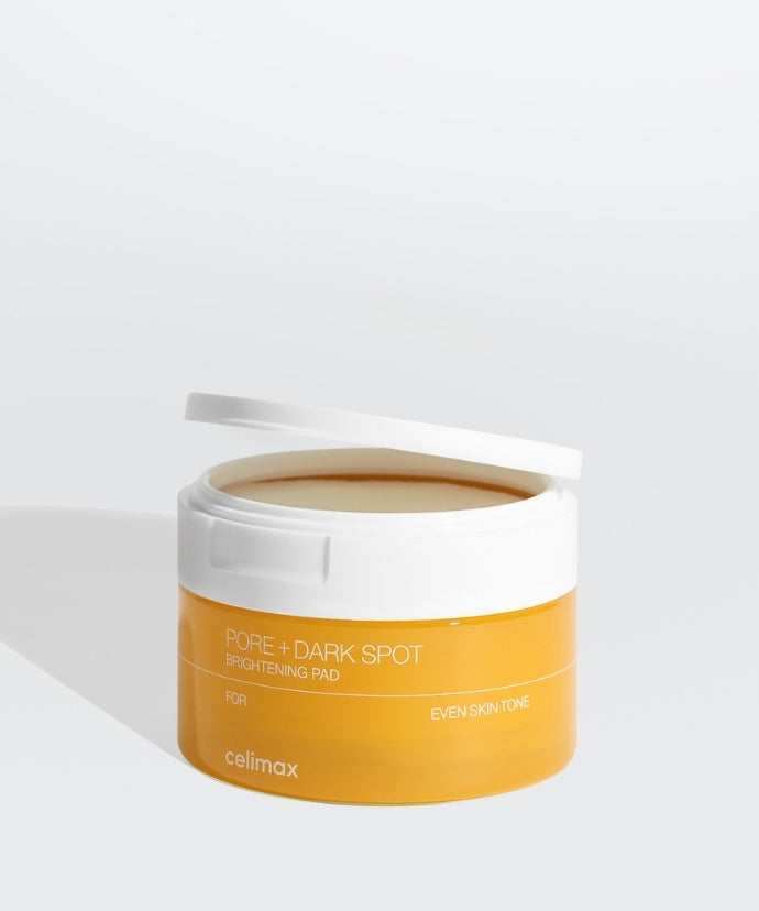 Pot de 40 tampons CELIMAX Pore Dark Spot Brightening Pad pour un teint lumineux, en fond blanc.
