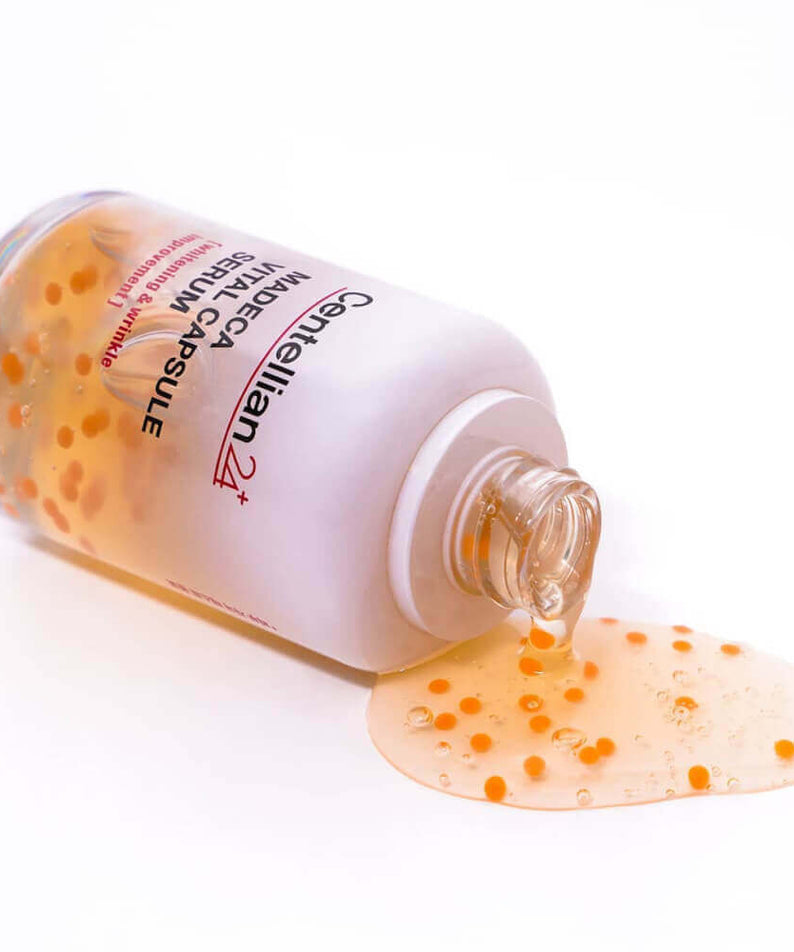 Sérum CENTELLIAN 24 Madeca Vital Capsule 50ml avec capsules visibles, renversé, flacon ouvert, beauté et soin de la peau.