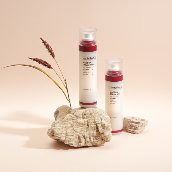 CENTELLIAN 24 Madeca Cream Mist 120ml de la marque Centellian, flacons sur roche et fleurs, fond beige