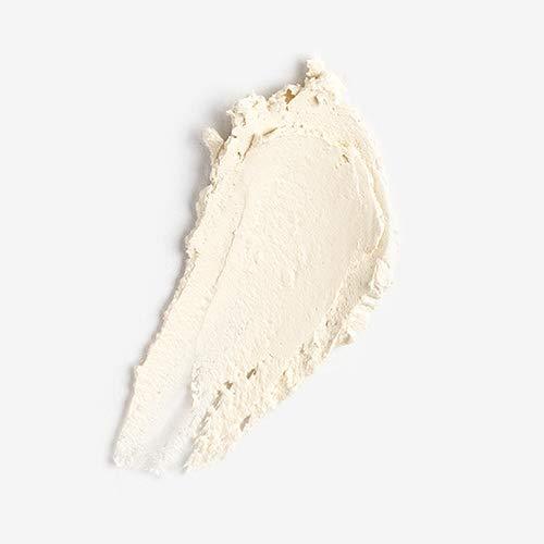 Décris l'image en français : CHARMZONE  Teeheehee Soothing Oat Clay Mask Stick 35g, texture d'argile à l'avoine sur fond blanc.
