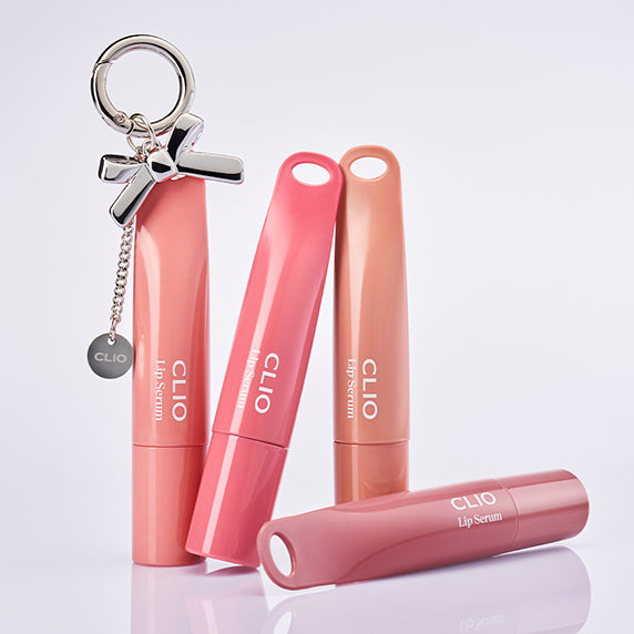 CLIO Glaze Lip Serum de CLIO, flacons et tube roses sur fond clair, rendu beauté maquillage