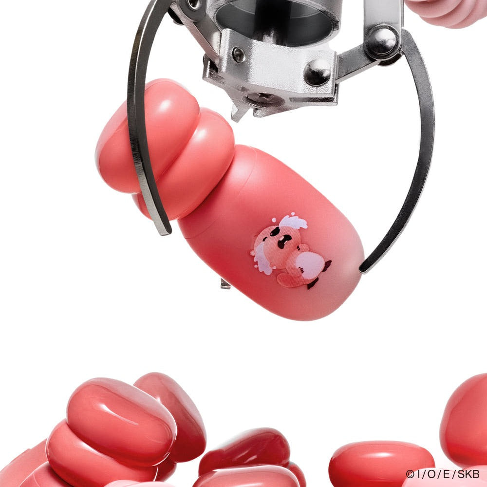 COLORGRAM Juicy Jam Blur Tint 5g, gros plan produit rose corail de la marque, texture et flacon sur fond blanc.