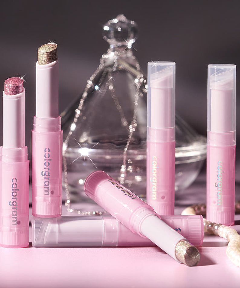 COLORGRAM Soft Jelly Stick 3g, maquillage des lèvres rose et pailleté, étui et décor perles, fond sombre