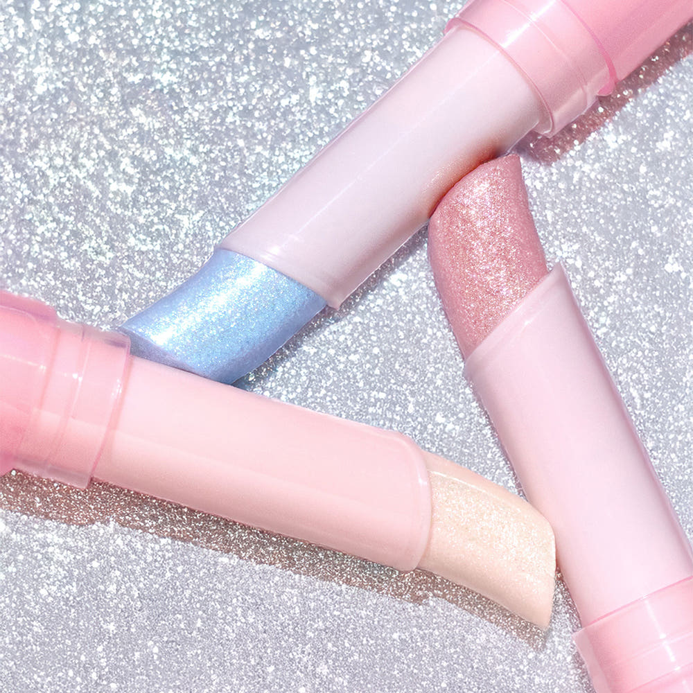 COLORGRAM Soft Jelly Stick 3g, tube maquillage pastel sur fond scintillant, textures jelly rose/bleu et étui visuel