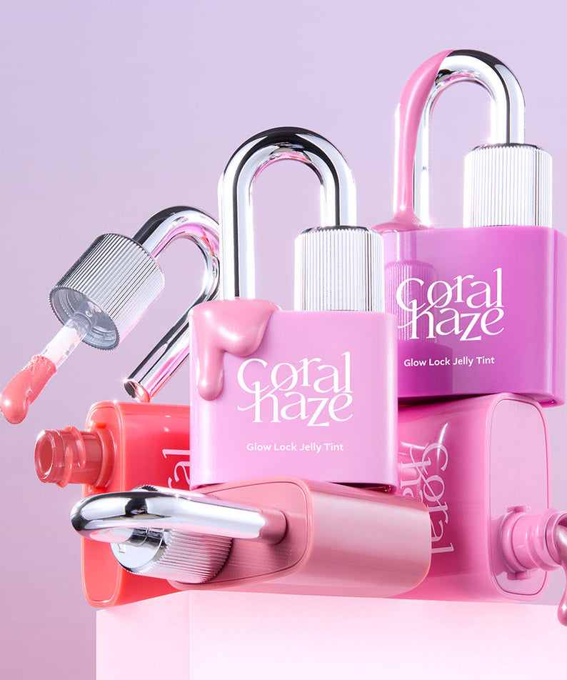 CORALHAZE Glow Lock Jelly Tint en trois teintes vibrantes et modernes avec bouchons chromés sur fond rose doux.