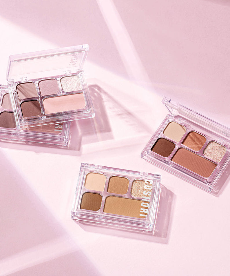 COSNORI My Moment Eye Palette 6.2g : palette fards yeux en boîtiers transparents, sur fond rose pastel, vue produit
