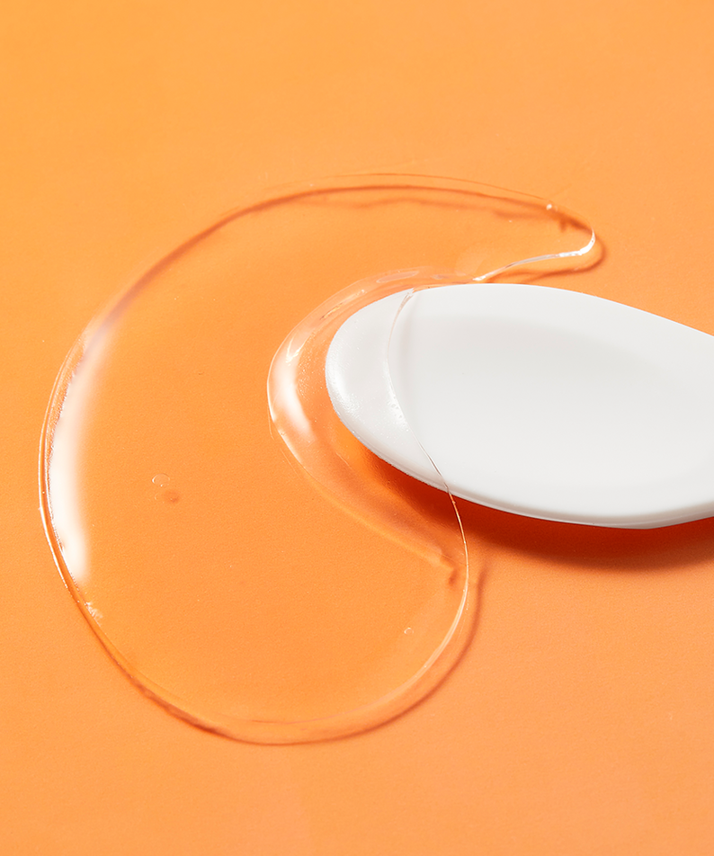 COSRX PDRN Collagen Vitalizing Hydrogel Eye Patches 60 patchs, gel translucide sur fond orange, marque COSRX.