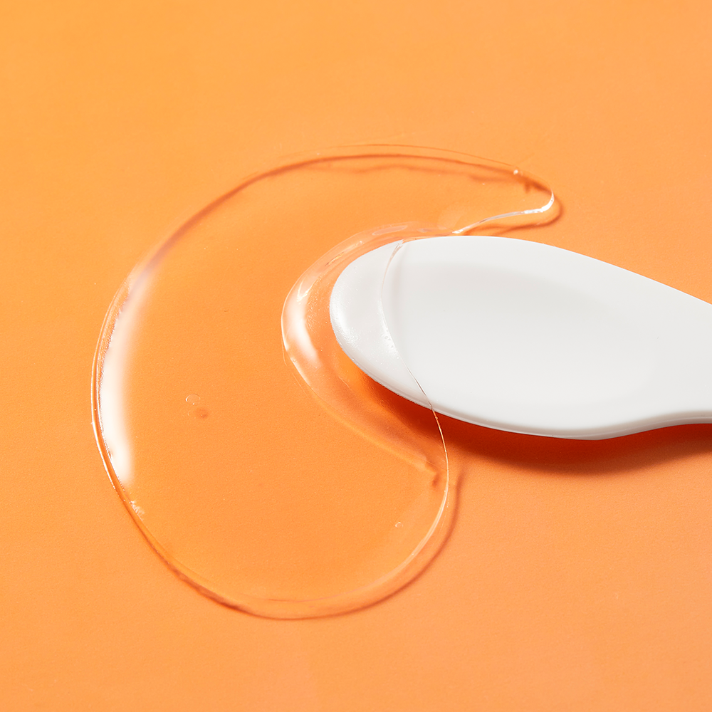 COSRX PDRN Collagen Vitalizing Hydrogel Eye Patches 60 patchs, gel translucide sur fond orange, marque COSRX.