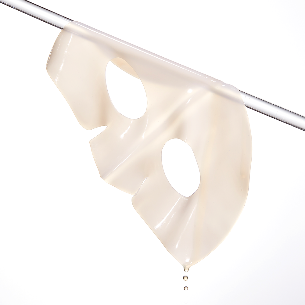 COSRX The Alpha-Arbutin Discoloration Care Hydrogel Mask (3EA), marque COSRX : masque hydrogel beige suspendu, fond blanc.