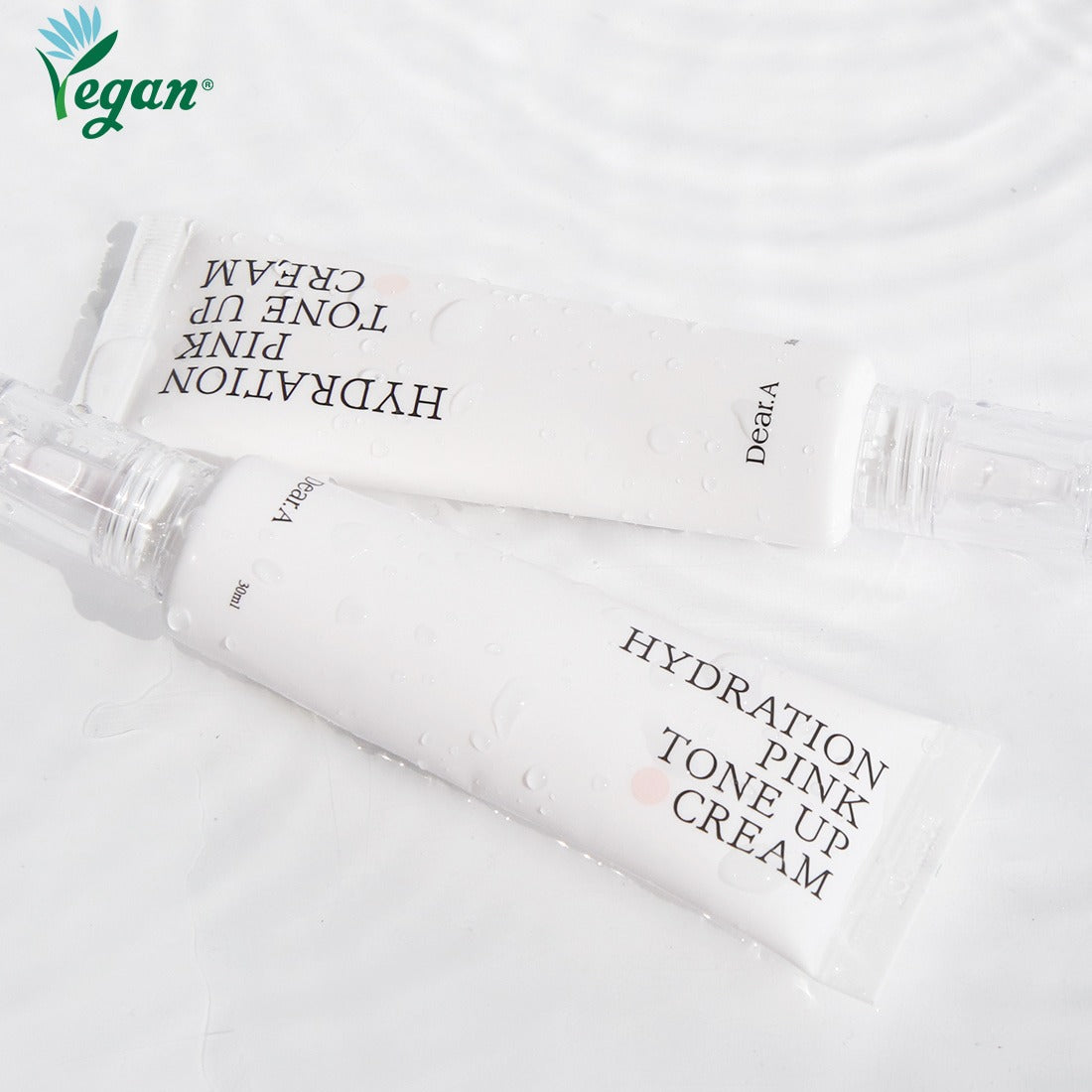 DEAR.A Hydration Pink Tone-Up Cream 30ml, tube rose de la marque DEAR.A sur fond blanc, produit en gros plan.