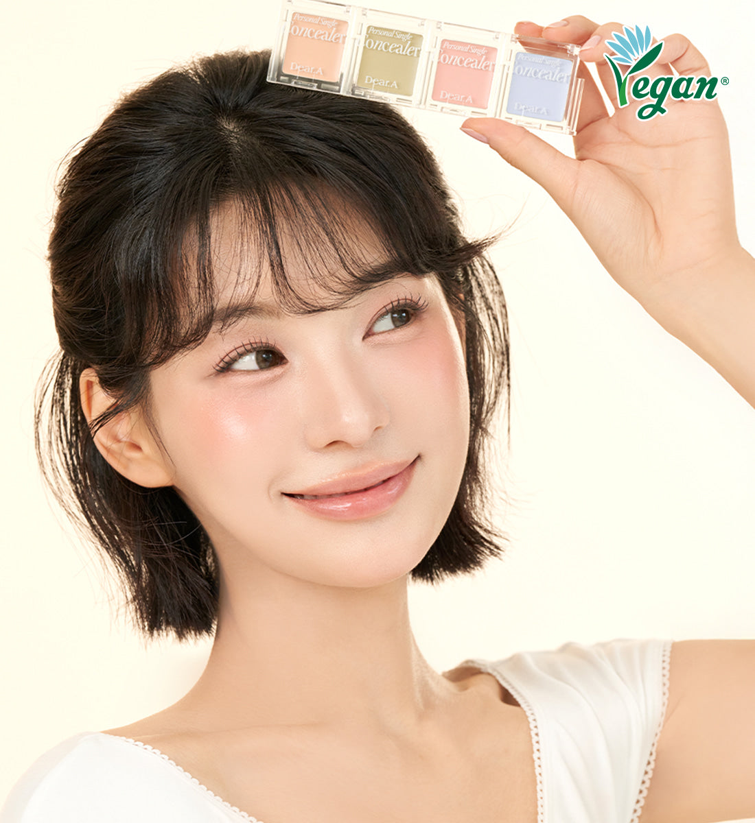 DEAR.A Single Concealer 10 Colors de la marque DEAR.A, gamme de teintes montrée près du visage, contexte maquillage vegan