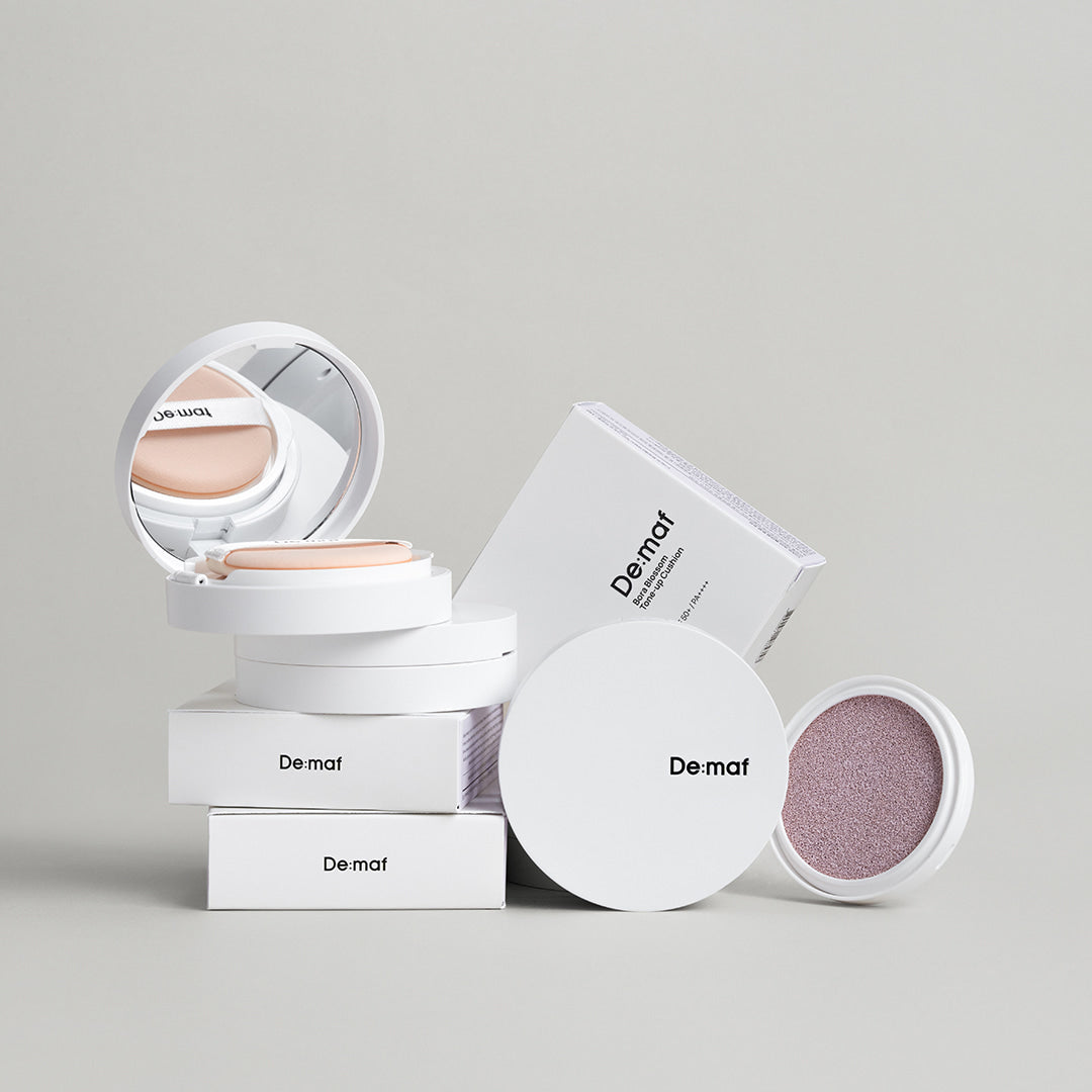 DE:MAF Bora Blossom Tone-Up Cushion de Demat, coussin maquillage sur fond clair avec packaging visible, photo produit