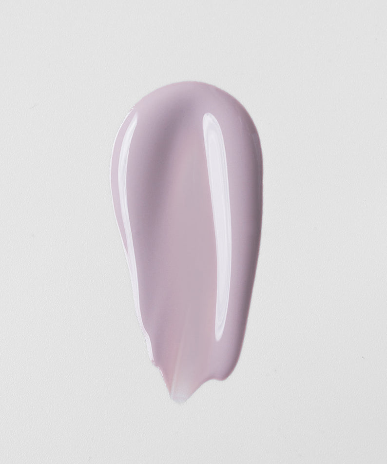 DE:MAF Bora Blossom Tone-Up Cushion de la marque DE:MAF, texture crème rose lavande sur fond clair.