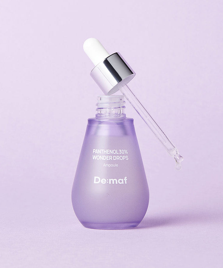 DE:MAF Panthenol 30% Wonder Drops 55ml, flacon mauve et pipette sur fond clair, produit Dé:maf.