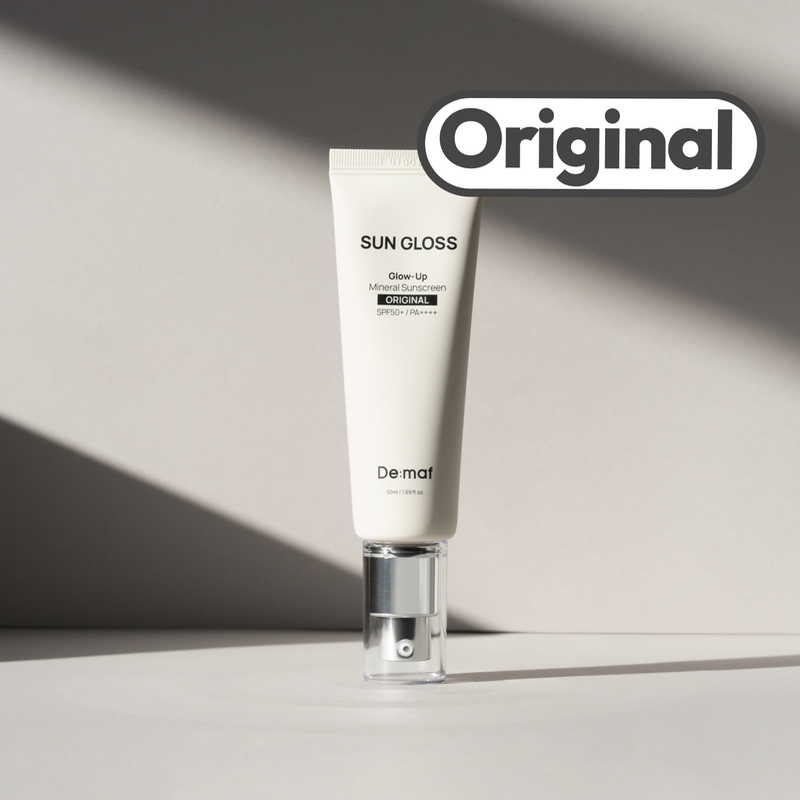 DE:MAF Sun Gloss Glow Up Inorganic Sunscreen 50ml Original, tube De:maf sur fond minimal, mention Original, soleil/Glow.