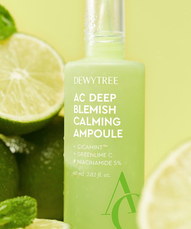 Image du produit DEWYTREE AC Deep Trace Soothing Ampoule Planning Set 60ml entouré de citrons limes frais. Flacon vert clair.
