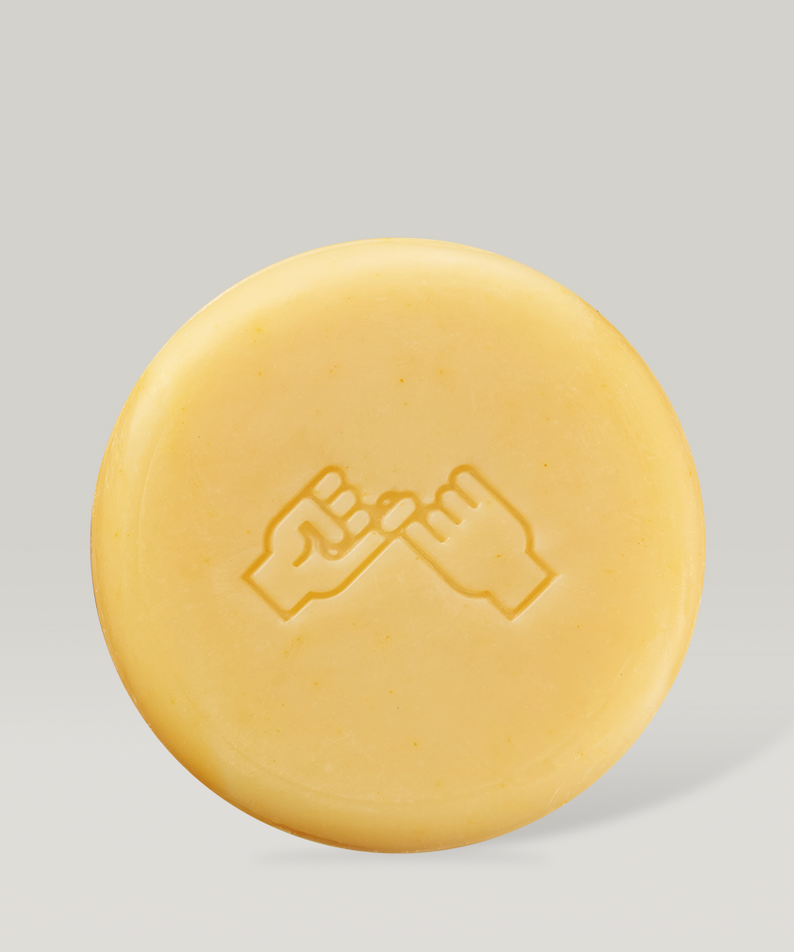 Décris l'image en français en mentionnant le produit, la marque et le contexte visuel : DONGGUBAT Correct Shampoo Bar For Oily Skin.
