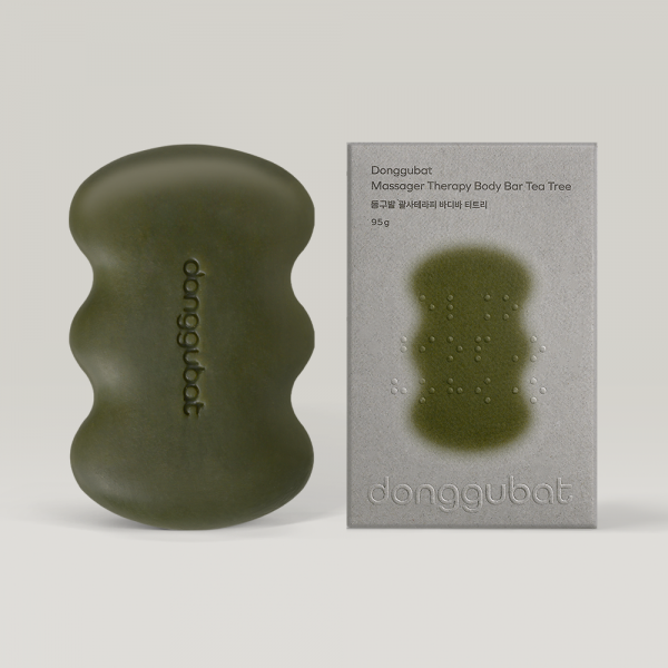 DONGGUBAT Gwalsa Therapy Body Bar Tea Tree 95g : barre de massage verte et coffret, fond clair, ambiance soins beauté.