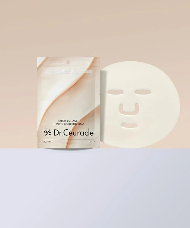 DR.CEURACLE Expert Collagen Firming Modeling Mask 30g, masque visage sur fond clair avec packaging, ambiance spa.