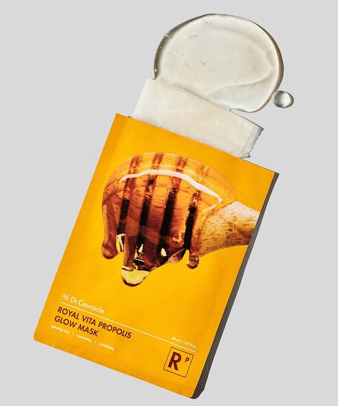 DR.CEURACLE Royal Vita Propolis Glow Mask (10EA) de la marque sur fond clair, masque visage en sachet doré.