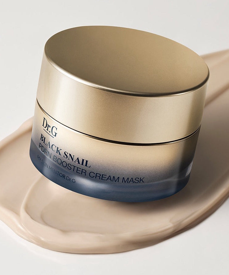 Dr. G Black Snail PDRN Booster Cream Mask 50mL sur fond crème, soin visage luxueux, hydratation et régénération de la peau.