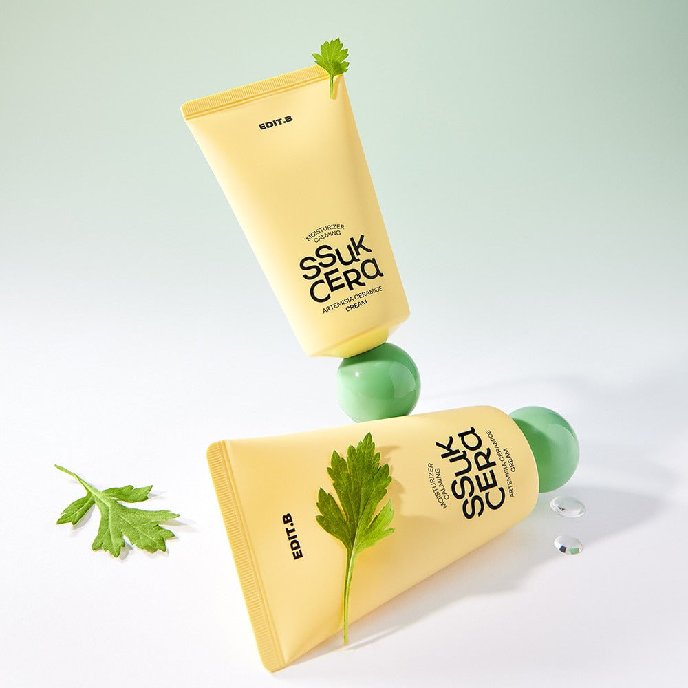 EDIT.B Moisturizing Soothing Mugwort Ceramide Cream 100ml, tube beige sur fond clair avec feuilles de mugwort vertes