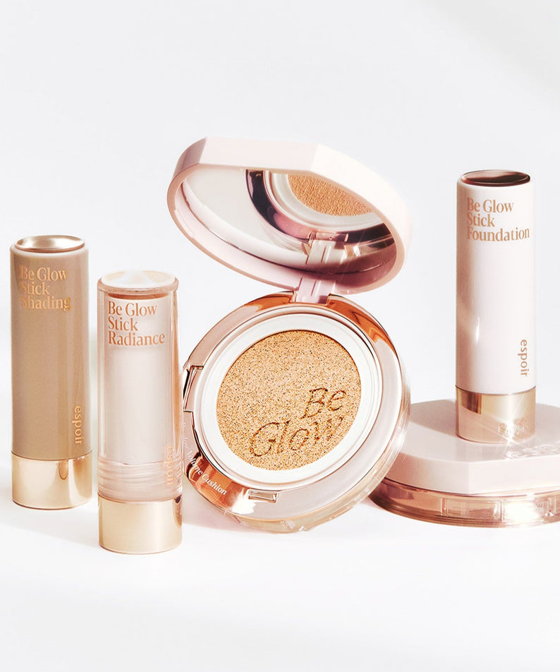 Coffret maquillage ESPOIR BE GLOW VOLUME CUSHION SPF42 PA+++ en teintes neutres, fondation en stick et coussin compact brillant.