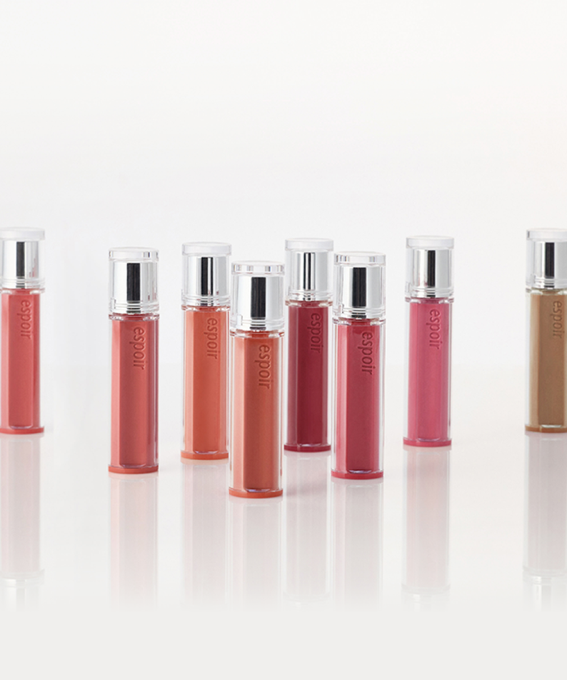 ESPOIR Couture Lip Tint Glaze [NEW COLOR], flacons brillants sur fond blanc, maquillage lèvres Décris l'image en français