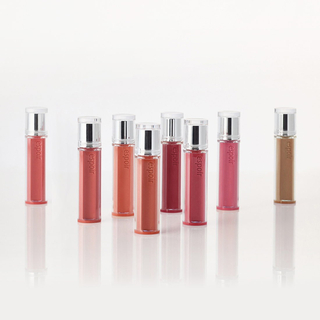 ESPOIR Couture Lip Tint Glaze [NEW COLOR], flacons brillants sur fond blanc, maquillage lèvres Décris l'image en français