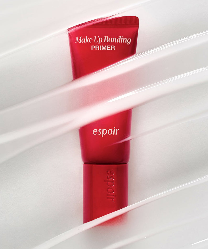ESPOIR Make Up Bonding Primer de la marque espoir, tube rouge dans un étui blanc, contexte maquillage