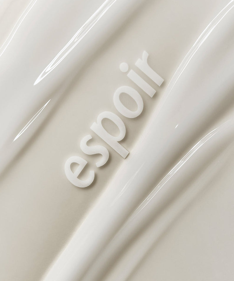ESPOIR Make Up Bonding Primer, tube crème beige sur fond clair, visuel maquillage de la marque ESPOIR.