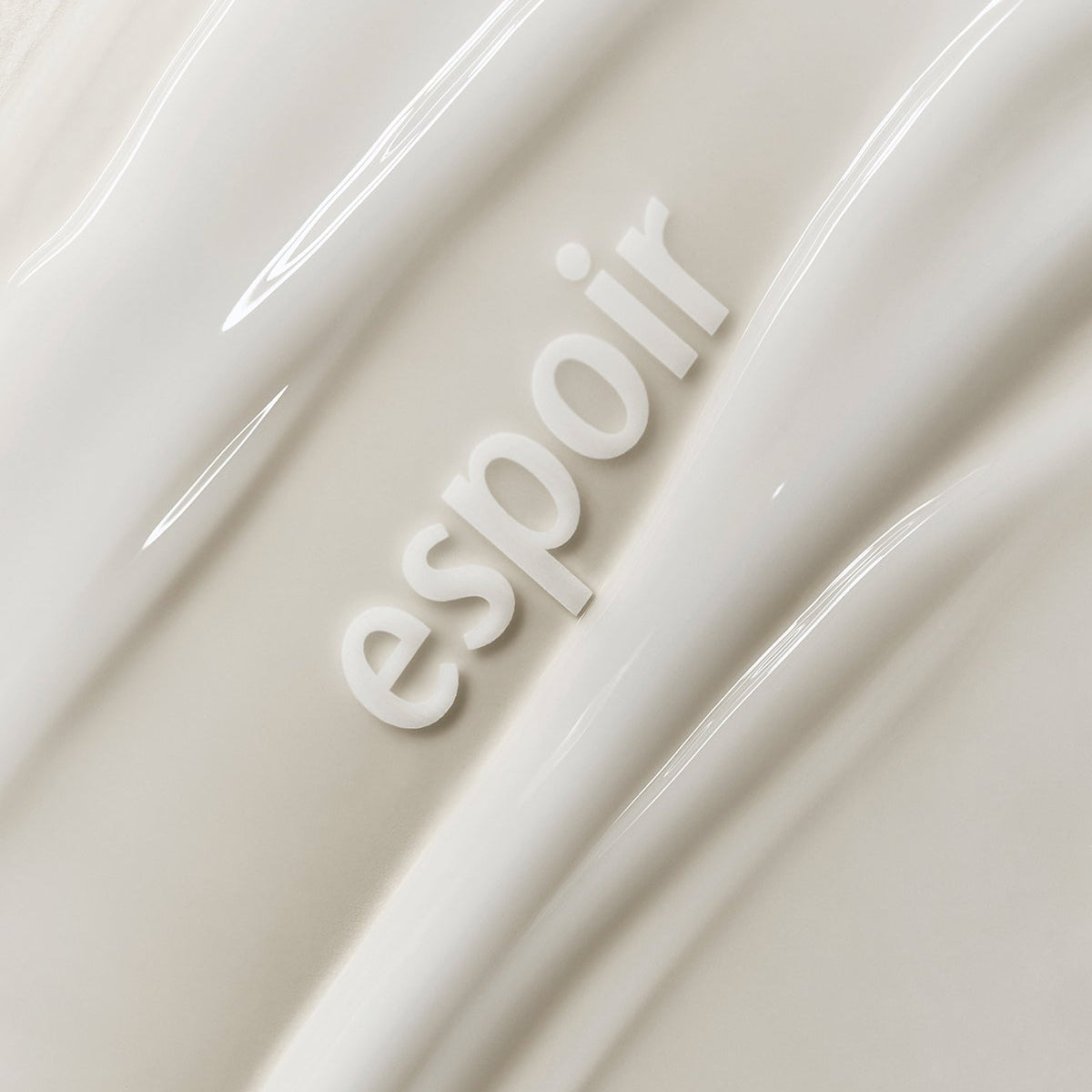ESPOIR Make Up Bonding Primer, tube crème beige sur fond clair, visuel maquillage de la marque ESPOIR.
