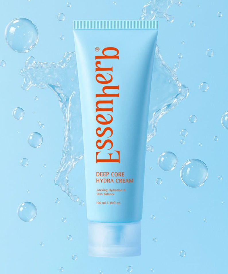 ESSENHERB Deep Core Hydra Cream 100ml, crème hydratante en tube sur fond bleu avec éclaboussures d’eau (visuel produit)