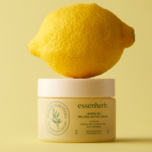 ESSENHERB Lemon Dill Melting Buttercream 55ml, pot de marque sur fond jaune, agrume au-dessus, contexte visuel culinaire.