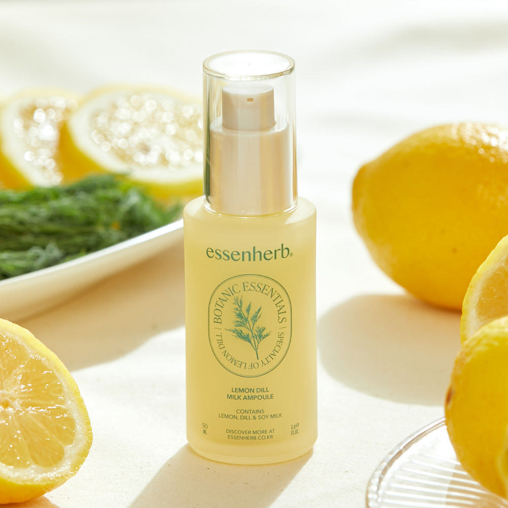 ESSENHERB Lemon Dill Milk Ampoule 50ml, marque essenh er b, flacon sur fond blanc avec citrons et herbes, contexte visuel.