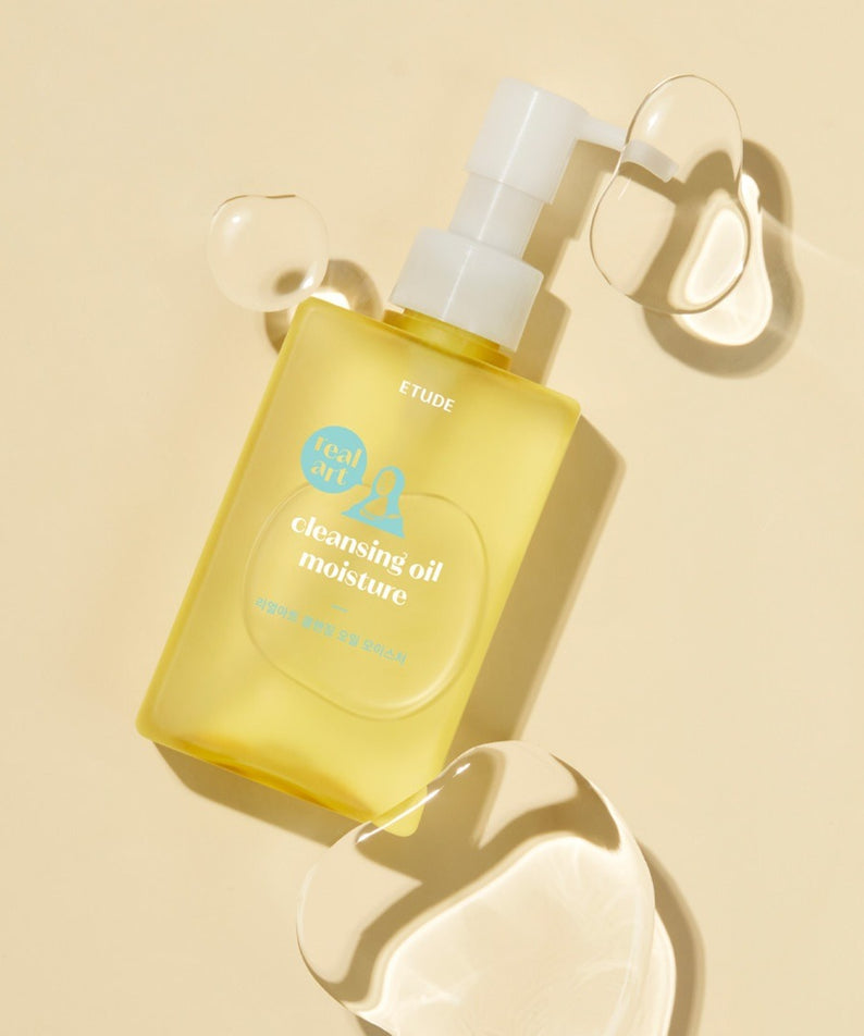 ETUDE  Real Art Cleansing Oil Moisture 2-piece set (185ml+185ml) sur fond crème, flacons et huile, visuel produit