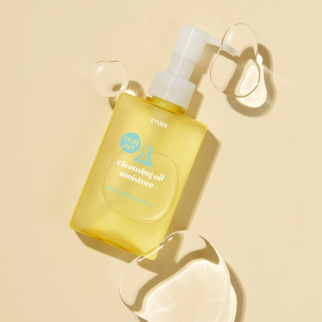 ETUDE  Real Art Cleansing Oil Moisture 2-piece set (185ml+185ml) sur fond crème, flacons et huile, visuel produit