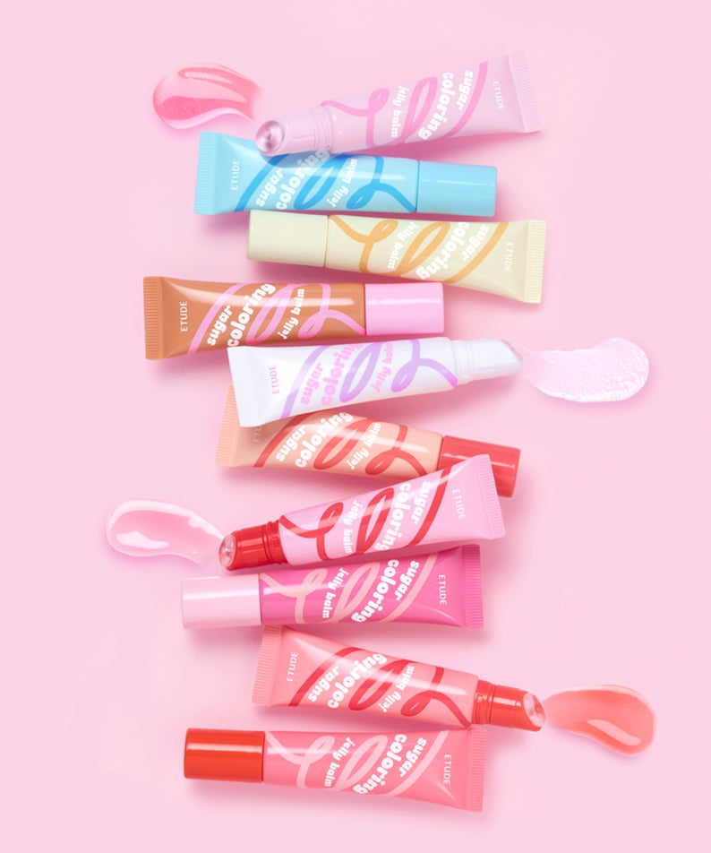 ETUDE Sugar Coloring Jelly Balm 9g : baumes gélifiés aux teintes, tubes roses et rouges sur fond rose pastel.