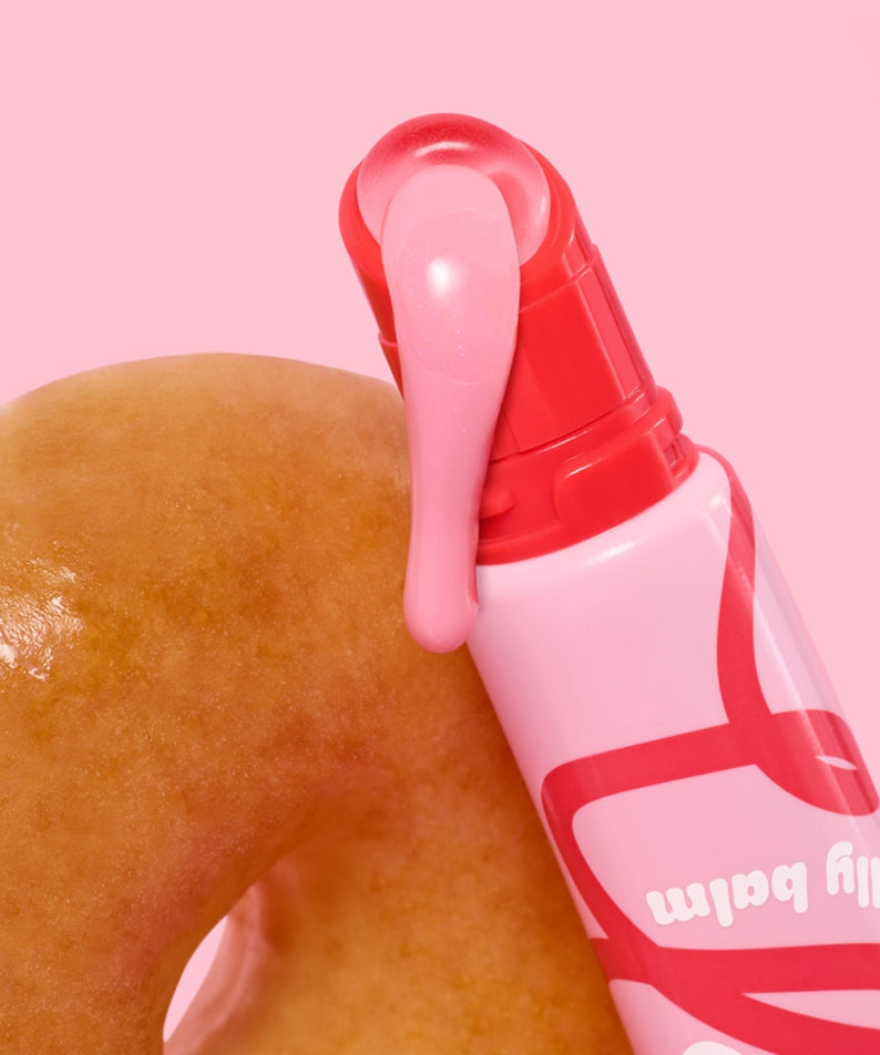 ETUDE  Sugar Coloring Jelly Balm 9g de la marque ETUDE, packaging rose sur fond rose, texture brillante visible.
