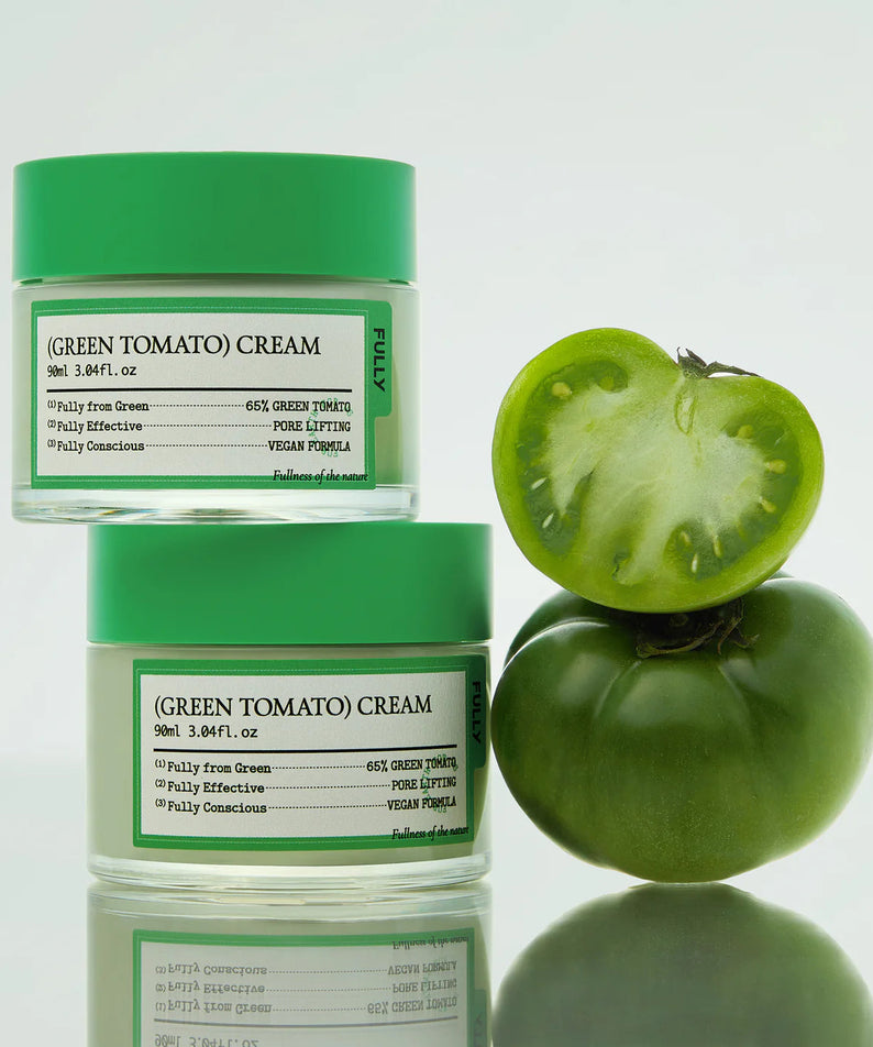 FULLY  Green Tomato Cream 90ml : pot de crème verte FULLY et tranches de tomate sur fond blanc.
