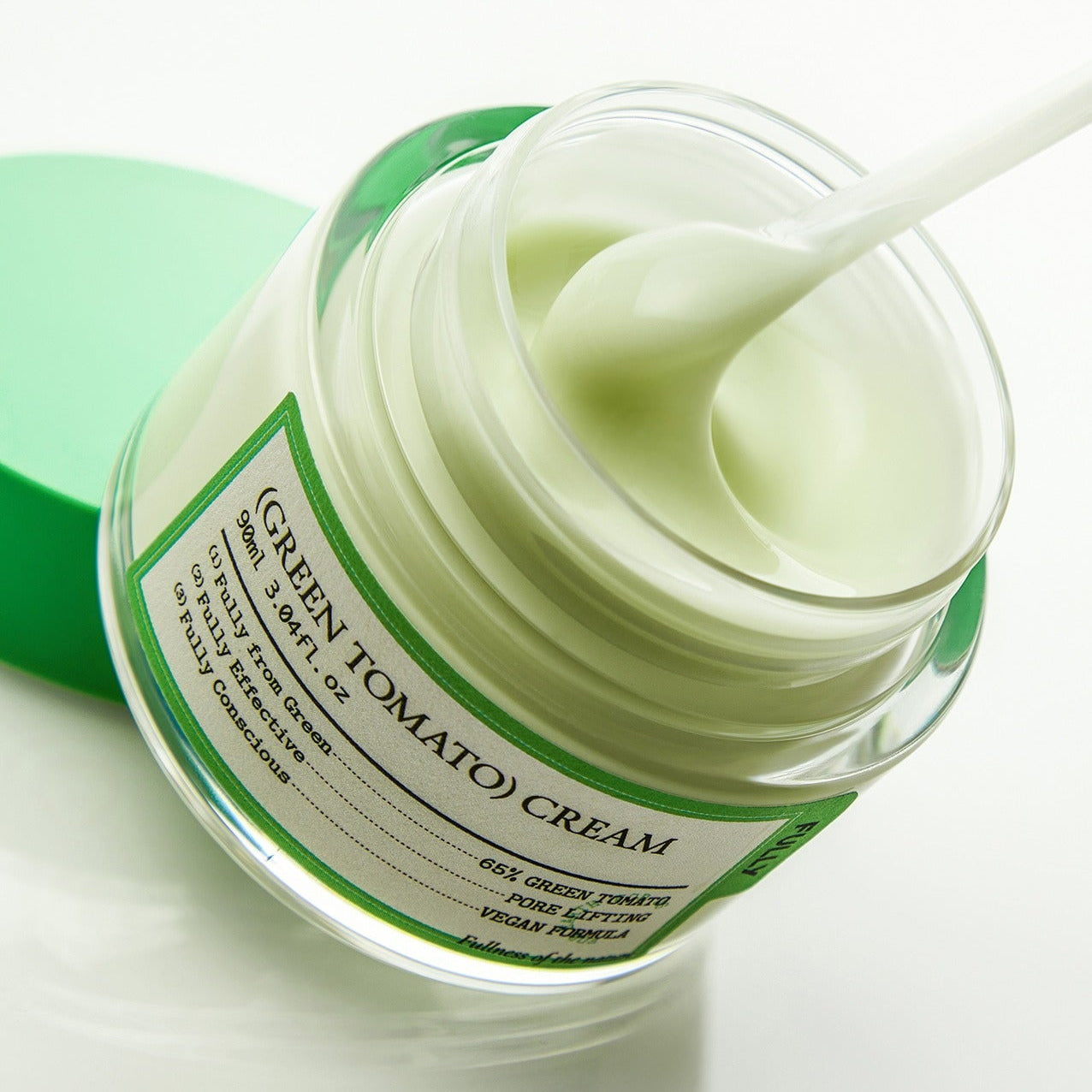 FULLY Green Tomato Cream 90ml : pot de crème verte avec texture lisse, sur fond clair, marque FULLY, contexte beauté