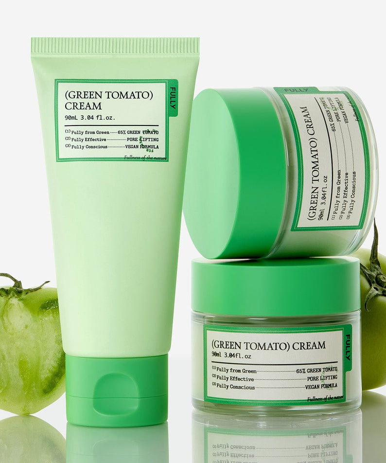 Décrivez l'image en français : FULLY Green Tomato Cream Tube 90ml de la marque FULLY, sur fond vert avec tomates.