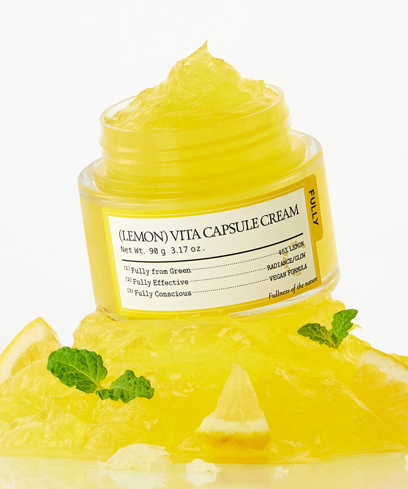 FULLY Lemon Vita Capsule Cream 90g, crème jaune citron FULLY en pot, visuel décoré de citrons et feuilles, fond clair.