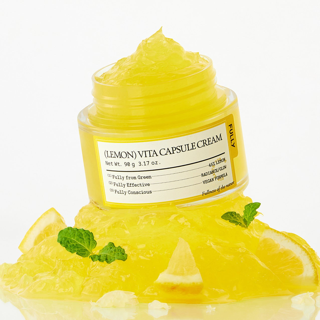 FULLY Lemon Vita Capsule Cream 90g, crème jaune citron FULLY en pot, visuel décoré de citrons et feuilles, fond clair.