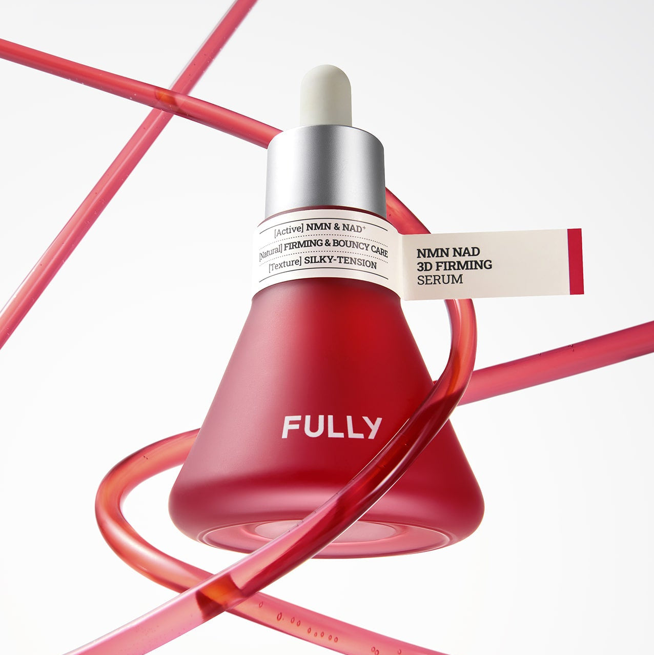 FULLY  NMN NAD Elasticity Serum de la marque FULLY, flacon rouge sur fond blanc avec rubans rouges croisés