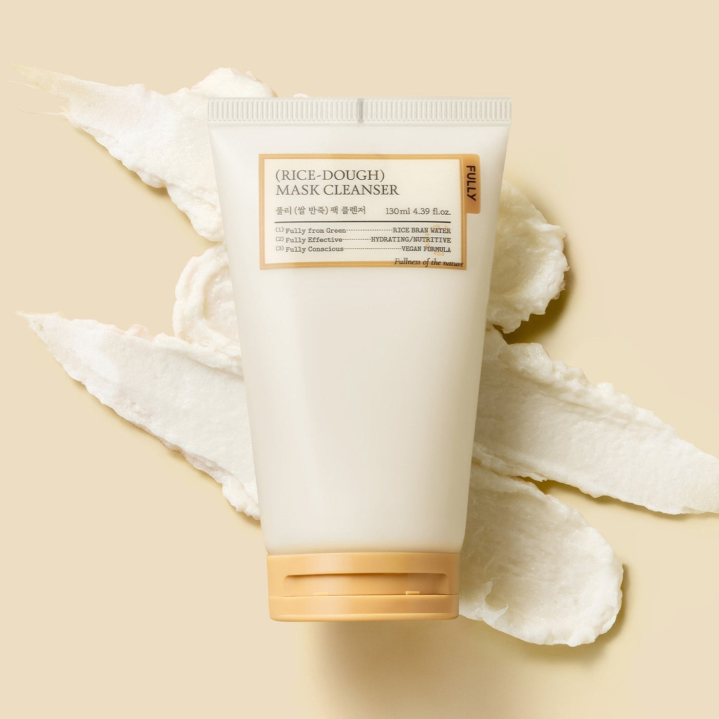 FULLY  Rice Dough Pack Cleanser 130ml, tube de nettoyant sur fond beige avec feuilles de riz blanches, visuel produit