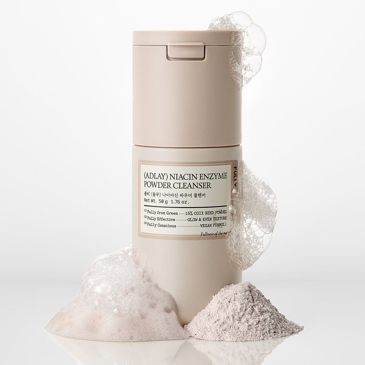 FULLY Yulmu Niacin Enzyme Powder Cleanser 50g de FULLY, flacon sur fond blanc, poudre moussante et texture.