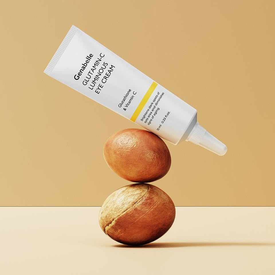GENABELLE Glutamin-C Luminous Eye Cream 10ml de la marque Genabelle, tube posé sur des fruits, fond beige