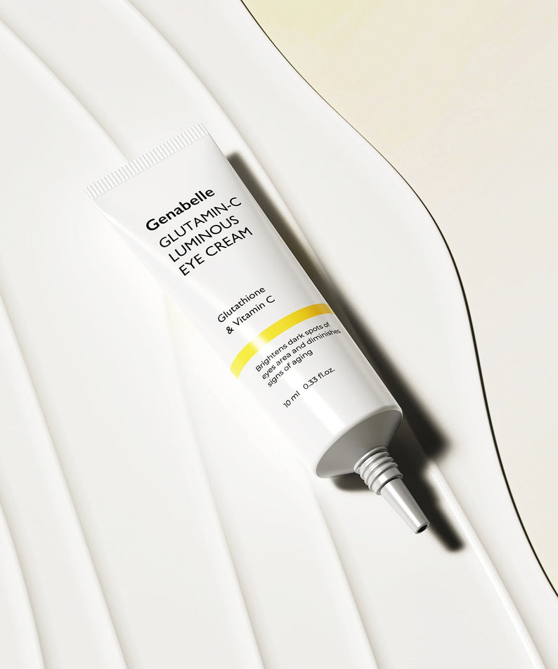 GENABELLE Glutamin-C Luminous Eye Cream 10ml de la marque Genabelle, tube sur fond crème, éclairage doux.