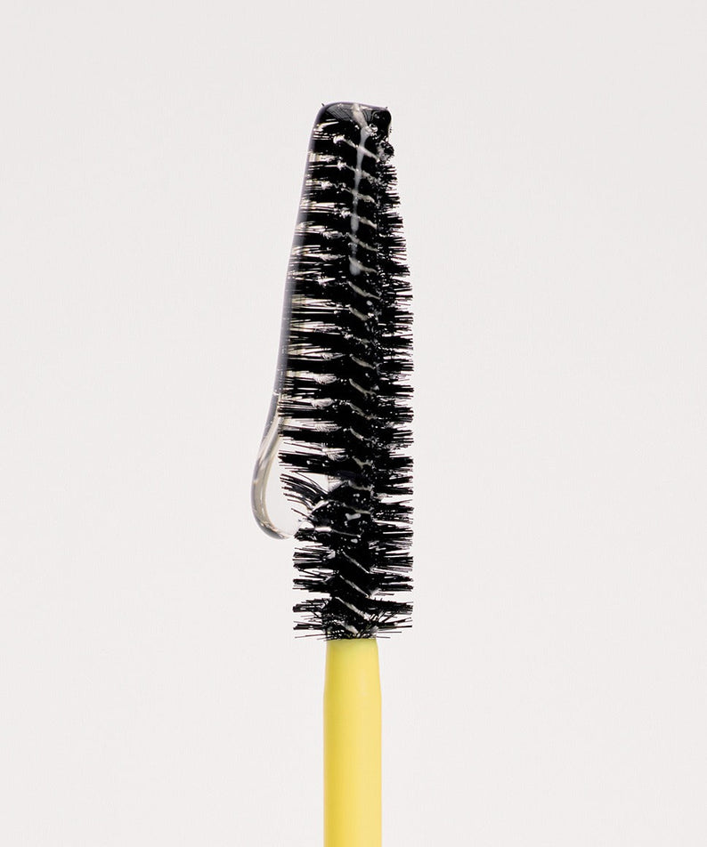 GLPHYO Hair Fixing Cara 12g, marque GLPHYO, brosse mascara pour cheveux sur fond clair, gros plan.